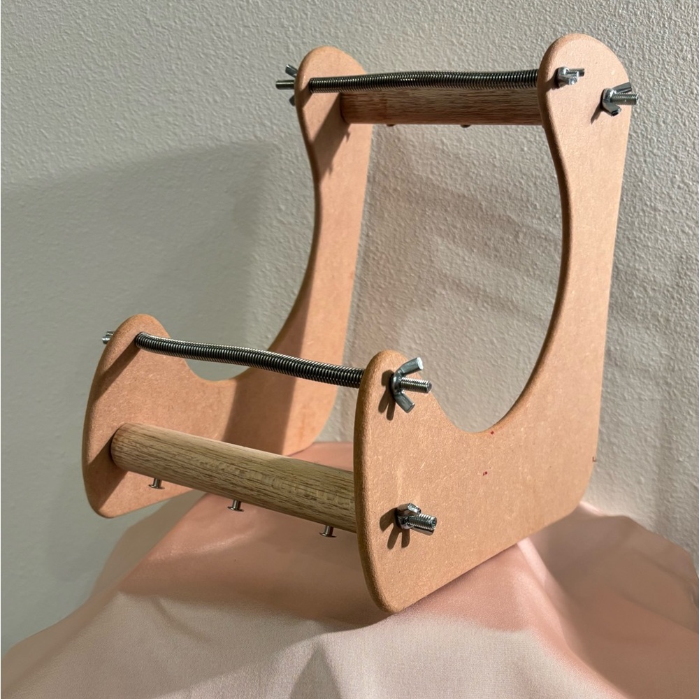 Wooden bead loom.